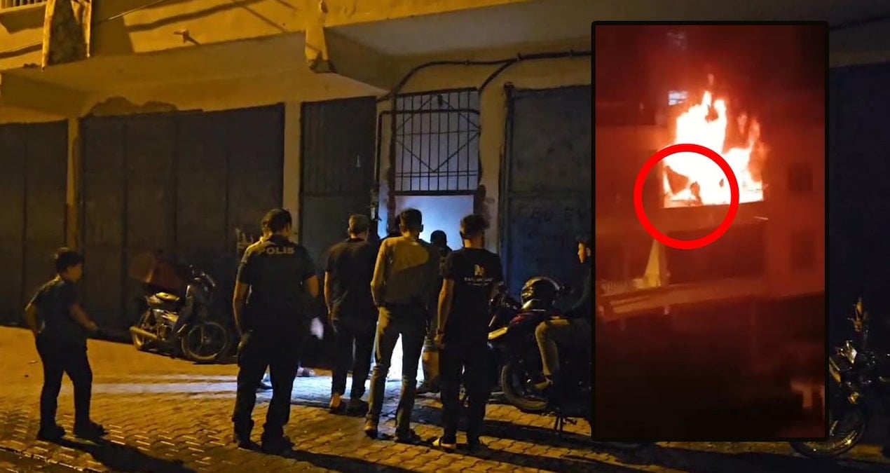 yanginda kalan cocugunu kurtarmak icin alevler arasina daldi sFBtpp9t